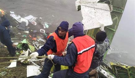 انتشال 21 جثة من بين حطام الطائرة النيبالية