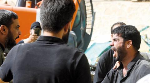 استنفار في العراق لإنقاذ عالقين في انهيار مزار ديني